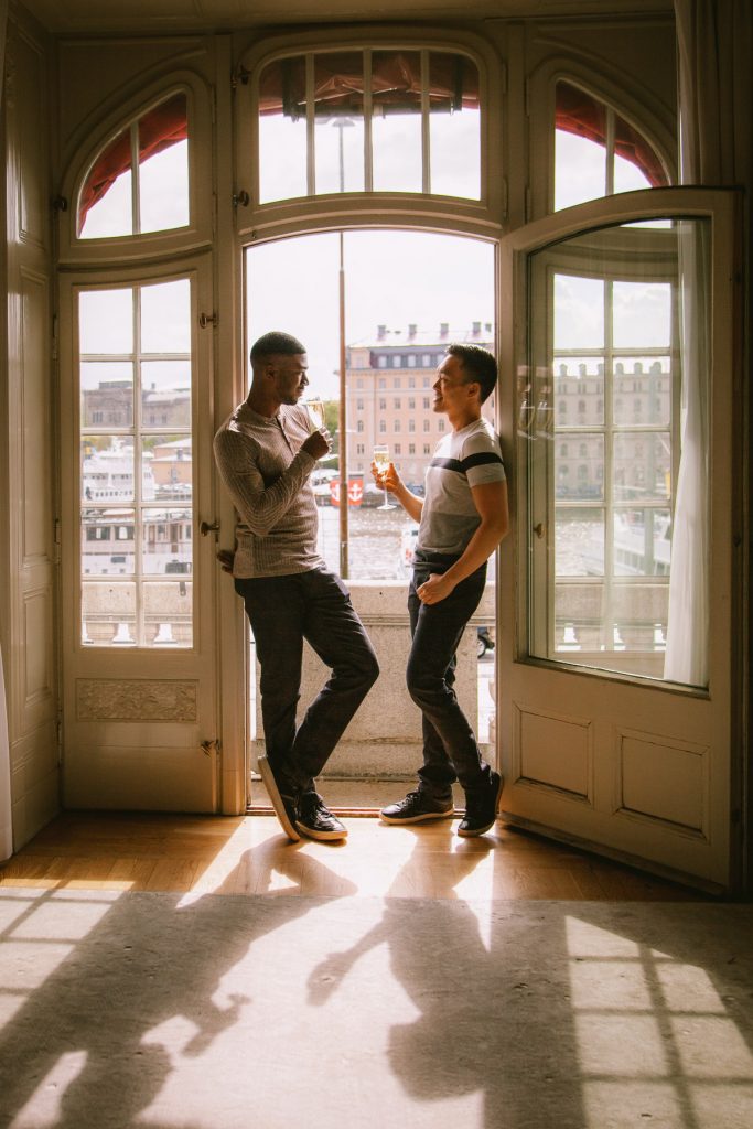 Gay couple hotel queer photographer