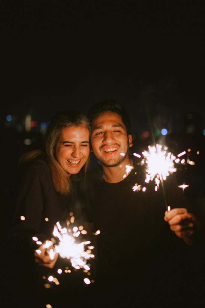 Couple photoshoot sparklers fireworks winter