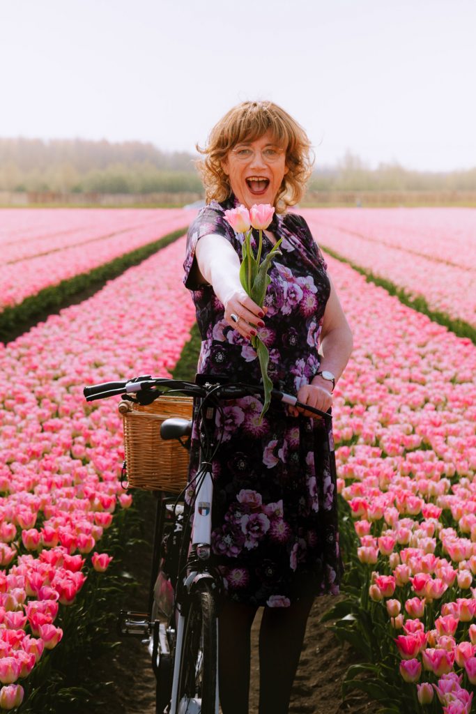Trans woman in tulip fields photoshoot